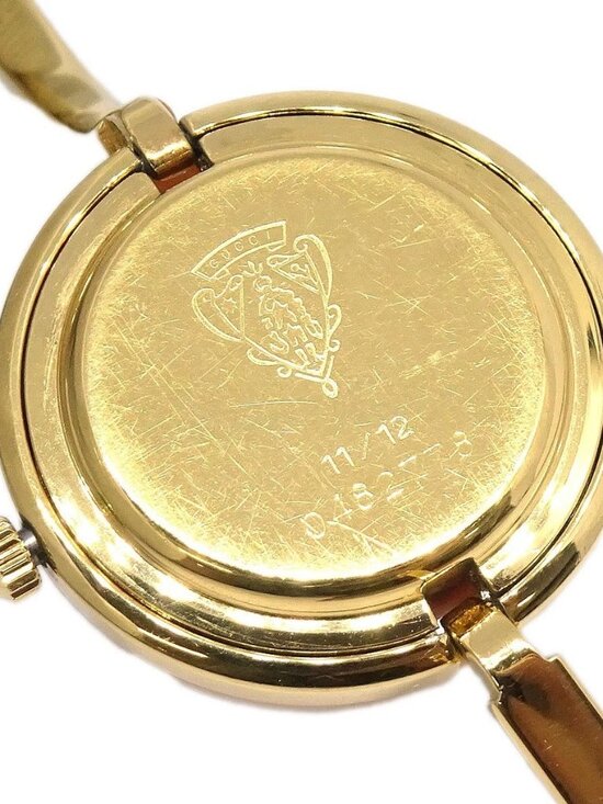 Gucci 11/12 Change Bezel Chameleon Quartz Watch SS 117880 main image 13